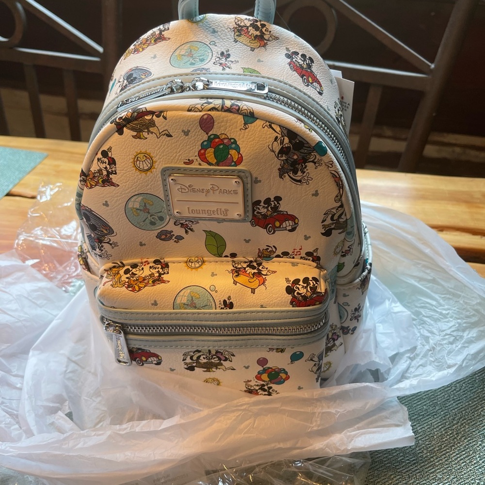 Disney parks Hollywood Minnie’s Runaway Railway Loungefly. NWT